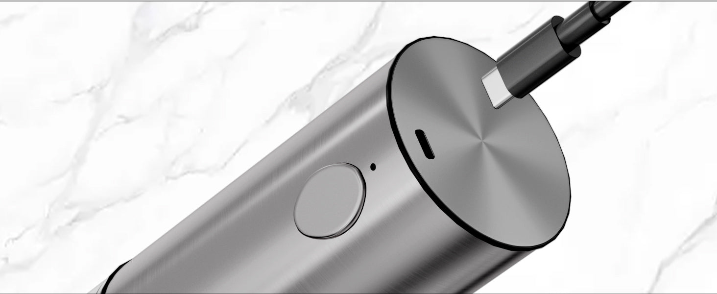 Silver electronic device with a circular component on a white marble background